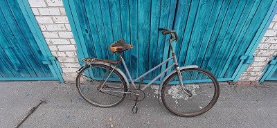 Велосипед, жіночого типу, сірого кольору, б/в