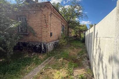 1/3 частина домоволодіння, загальною площею 68,0 кв.м., реєстраційний номер майна:13593629, за адресою: Дніпропетровська обл., м. Кривий Ріг, вул. Гомера, буд. №18