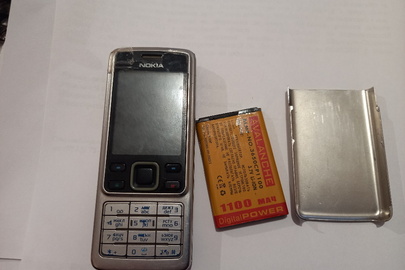 Мобільний телефон в корпусі сірого кольору, марки "Nokia", модель 6300, IMEI:359810017673087 з sim картою