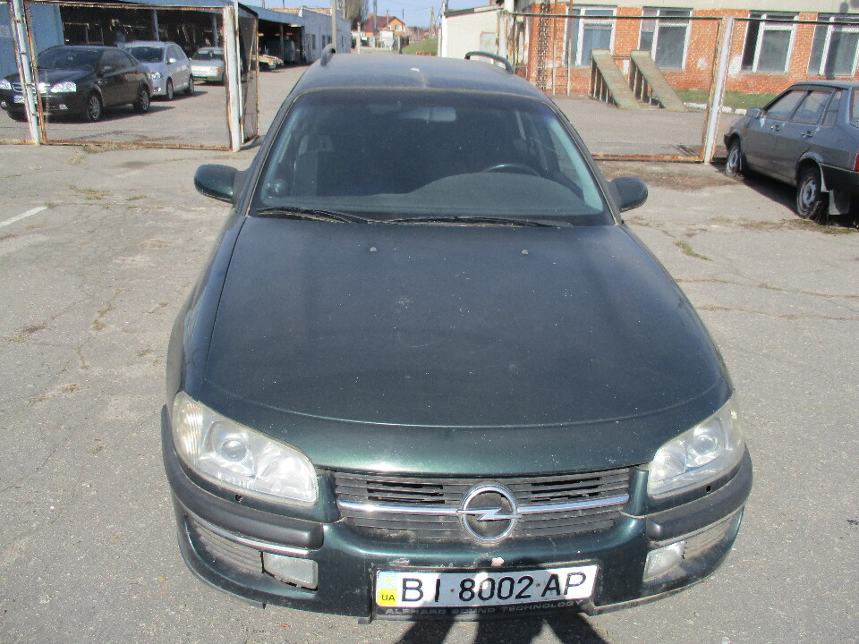 Колісний транспортний засіб Opel Omega B (легковий універсал-В), 1999 року випуску, реєстраційний номер не зареєстрований, колір зелений, кузов №WOLOVBM35X1026314