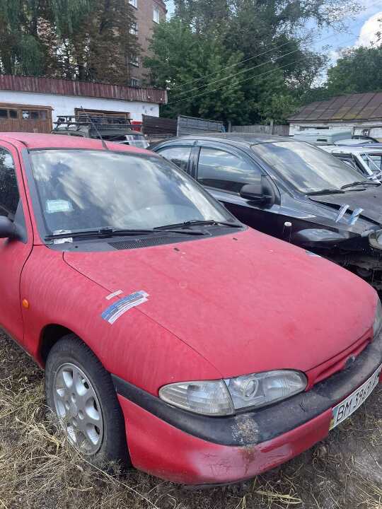Колісний транспортний засіб Ford Mondeo (легковий седан-В), 1993 року випуску, реєстраційний номер ВМ3969АІ, колір червоний, кузов WF0FXXGBBFPM27600
