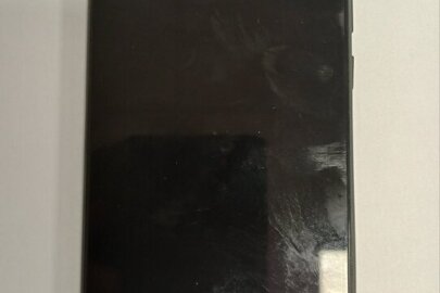 Конфісковане майно за ухвалою суду: мобільний телефон "MI", ІМЕІ 1:86573304750790 ІМЕІ 2:865733046962791, чорного кольору, б/в