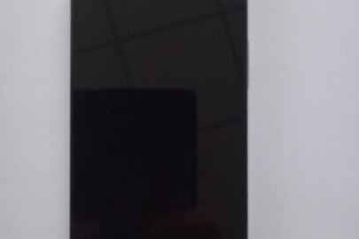 Конфісковане майно за ухвалою суду: мобільний телефон "REDMI", IMEI не встановлено, зеленого кольору, б/в