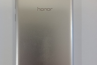 Конфісковане майно за рішенням суду: мобільний телефон  марки "HONOR", модель "DUA-L22", ІМЕІ: не встановлено, золотисто-білого кольору, б/в