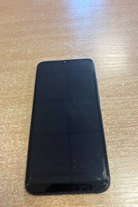 Конфісковане майно за ухвалою суду: мобільний телефон  марки "REDMI", модель M1810F6LG, IMEI  не встановлено, б/в