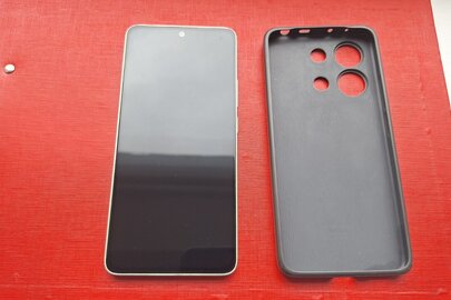 Конфісковане майно за вироком суду: мобільний телефон марки Redmi Note 13, серійний номер 53393/63Z903266, IMEI 1 861204068493325/54, б/в