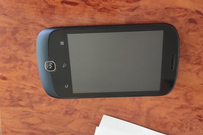 Мобільний телефон марки "Alсatel one touch 990" , в корпусі синього кольору, серійний номер 02UA 6RJC 11 MNV 990C-2AITUA1 3EDCF53D