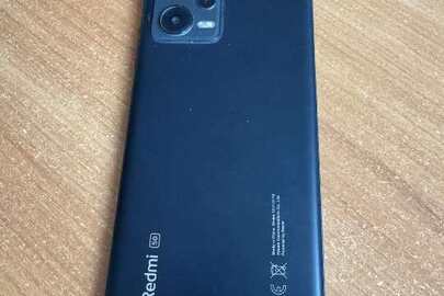 Конфісковане майно за рішенням суду: мобільний телефон Redmi Note 12 5G, б/в, заблокований, наявний прозорий чохол