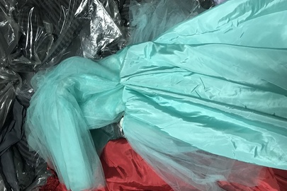 Товар ідентифіковано як сукню дитячу святкову в асортименті. На товарі наявне наступне маркування: «BUTTERFLY». Кількість 25 шт