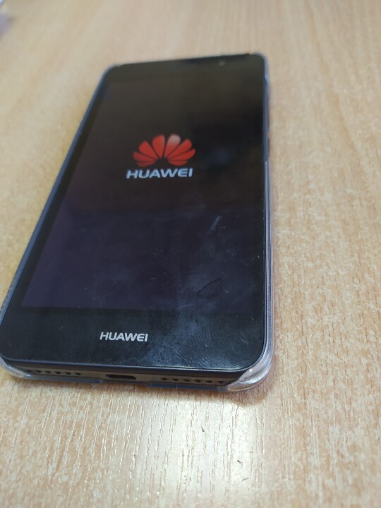 Мобільний телефон марки HUAWEI TIT-U02, чорного кольору, IMEI 861855035711550, 861855037764268, б/в