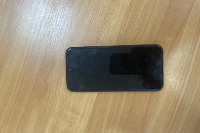 Мобільний телефон "Redmi Note 7", модель М1901 F7G, ІМЕІ 1: 8631130412022729, ІМЕІ 2: 863113041932721 у силіконовому чохлі коричневого кольору, б/в