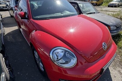 Транспортний засіб: марки Volkswagen, модель: Beetle, категорія: легковий, реєстраційний номер АН0100ІС, рік виробництва: 2013, VIN/номер шасі (кузова, рами): WVWZZZ16ZDM659943, колір: червоний