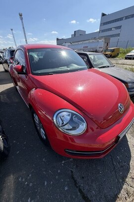 Транспортний засіб: марки Volkswagen, модель: Beetle, категорія: легковий, реєстраційний номер АН0100ІС, рік виробництва: 2013, VIN/номер шасі (кузова, рами): WVWZZZ16ZDM659943, колір: червоний