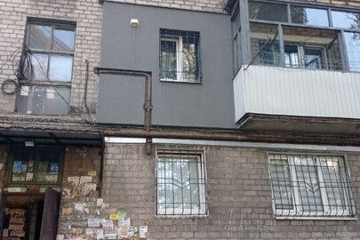 з-кімнатна квартира №24 загальною площею 55,1 кв.м., розташована за адресою Дніпропетровська обл., м. Кам'янське (колишня назва м. Дніпродзержинськ), вул. Запорізька буд. 25