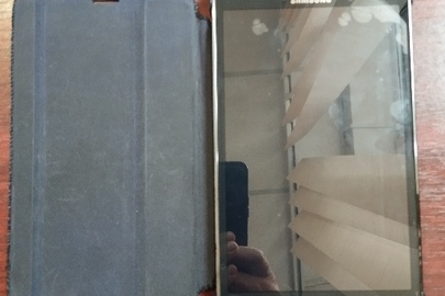 Конфісковане майно за рішенням суду, планшетний комп'ютер, марки "SAMSUNG" з операційною підтримкою сім-картки, перебував у використанні