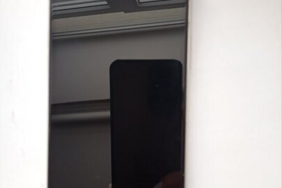 Конфіскація за рішенням суду :мобільний телефон марки "Iphone 11", б/в